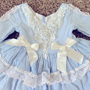 Girls light blue two tiered cupcake style lace trim dress. Lolita size 6